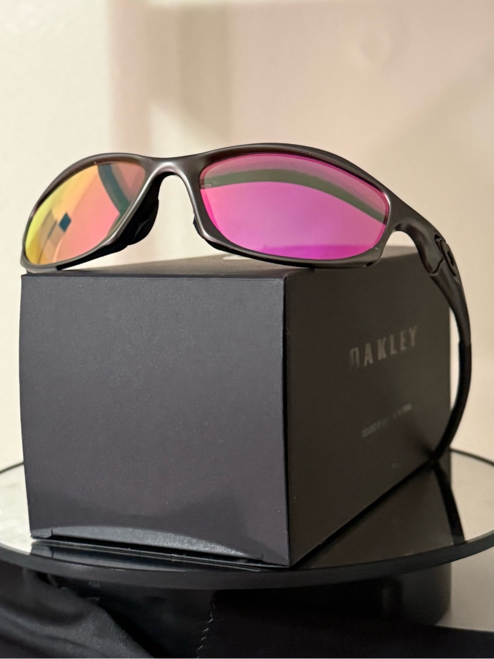 Oakley Matte Black Sunglasses with Pink Mirrored Lenses